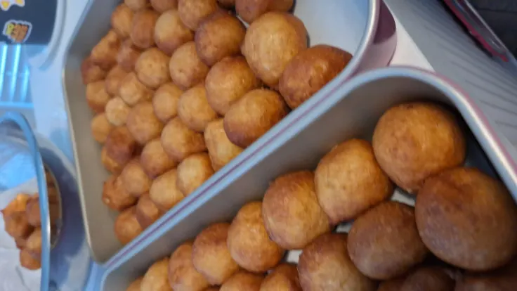 Trade show booth with live puff puff cooking